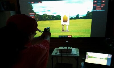 Portable indoor laser shooting simulator